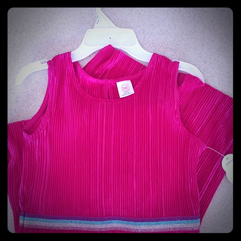 Girls pink jumpsuit - size M (7-8)
